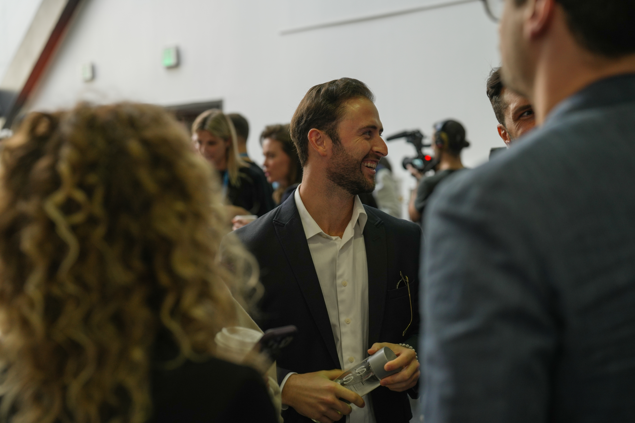 Three conference attendees posing together