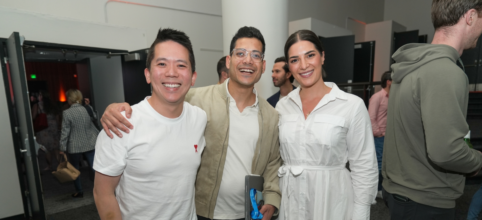 Attendees networking at conference venue